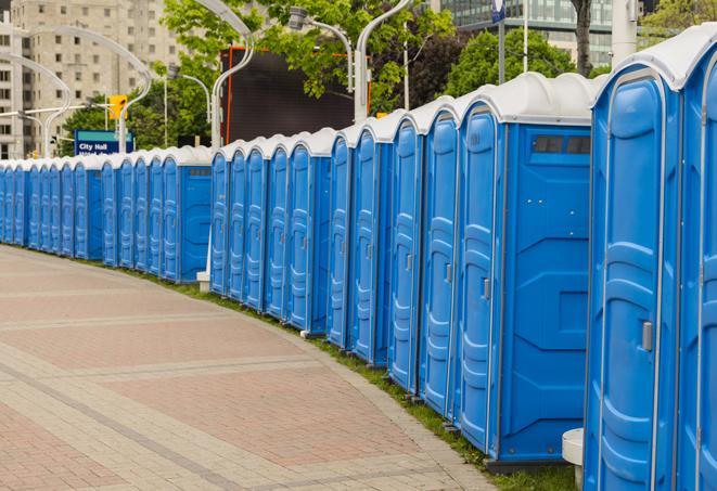 a row of portable restrooms set up for a special event, providing guests with a comfortable and sanitary option in Chamblee GA